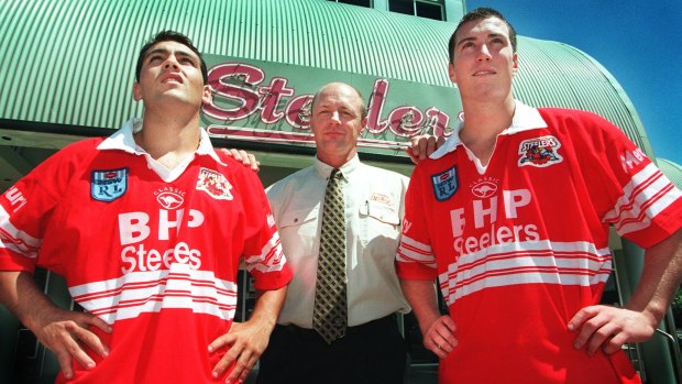 dt9903030331. dave tease. steelers. sport. story Mike Gandon..Steelers state 1st division players, Patrick Gibson, left and James Wynne right, with steelers coach Brian Johnson.