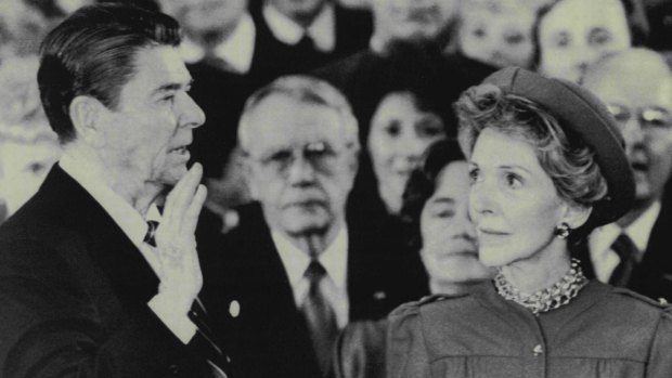 President Ronald Reagan repeats the oath of office as his wife Nancy holds the Bible in Washington, D.C., 1985. Religious lobbyists played a key role in his election in 1980.