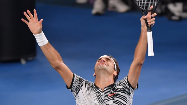 Roger Federer beats his old foe to claim the Australian Open.