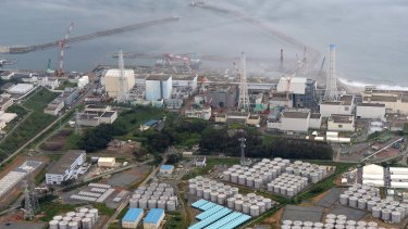 Under tsunami warning ... the troubled Fukushima Dai-ichi nuclear plant at Okuma, northern Japan.