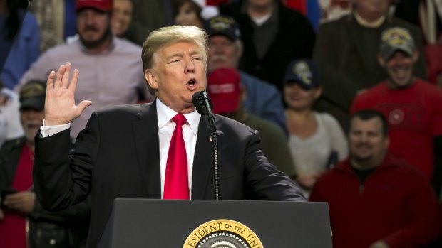 US President Donald Trump speaks during a rally in Pensacola, Florida in support of Moore.