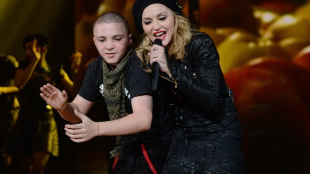 Rocco Ritchie and Madonna perform during the MDNA North America tour opener in 2012.