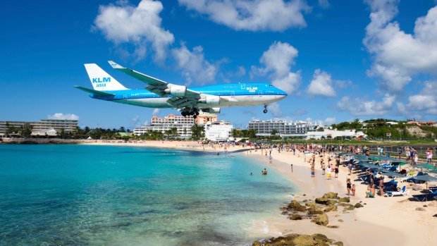 The last KLM 747 has roared over sunbathers on St Maarten beach.