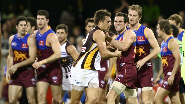 The Hawks and Lions tussle during their last Gabba clash in 2008.