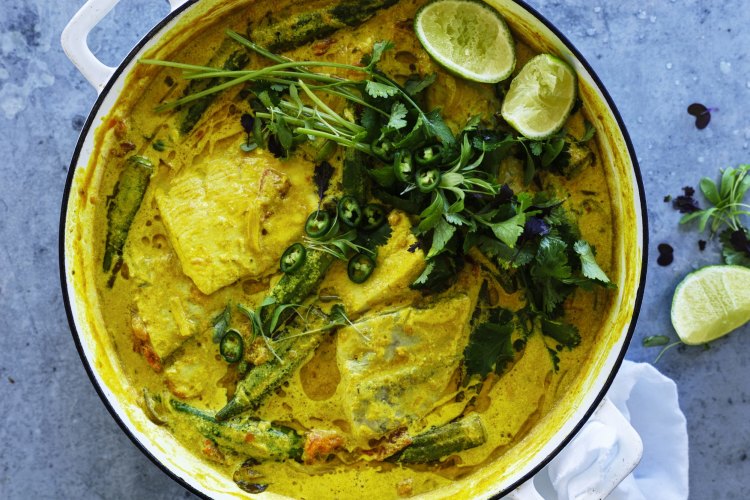 Adam Liaw's barramundi curry with tomato and coconut.