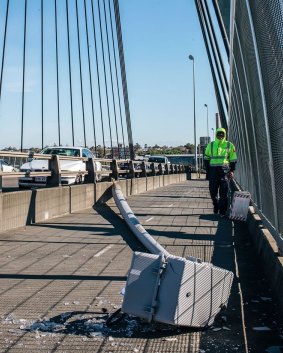 A light tower which fell across Anzac Bridge on Monday.