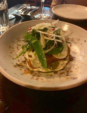 Snapper and trout croquette with fennel and watercress dressing.