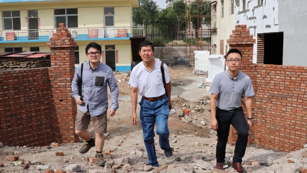 Jack Liang (left) and David Nan(right) at the former location of Bolang Biotechnology with chairman Chu Baolin.