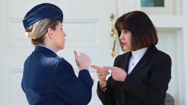 Karen Pence, right, talks with Air Force Colonel Michelle Pufall while welcoming female members of the military to a reception in recognition of Women's History Month.