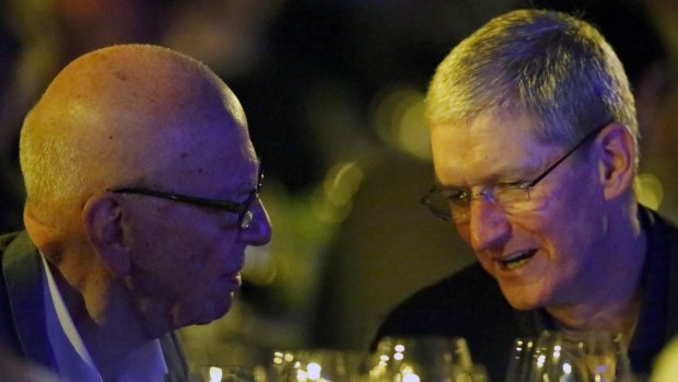 Apple CEO Tim Cook (right) with Rupert Murdoch, executive chairman of News Corp.