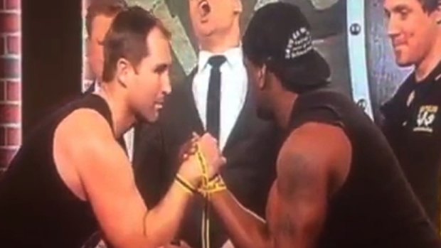 Ben Ross and Wendell Sailor preparing to arm-wrestle on <i>The Footy Show</i> on Thursday night.