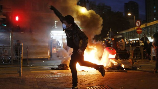 Rioters clashed with police into the early hours of Tuesday in a crowded area of Kowloon. 