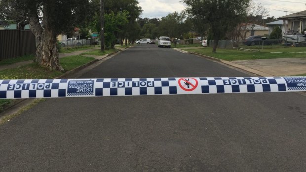 A large section of the street has been turned into a crime scene.