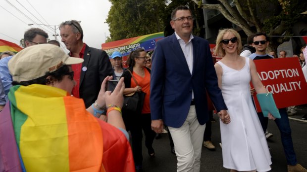 The Victorian Premier Daniel Andrews, with his wife Catherine, at the annual Pride March in St Kilda in 2015. The Premier will issue an apology on May 24, 2016, for laws that once criminalised homosexuality.