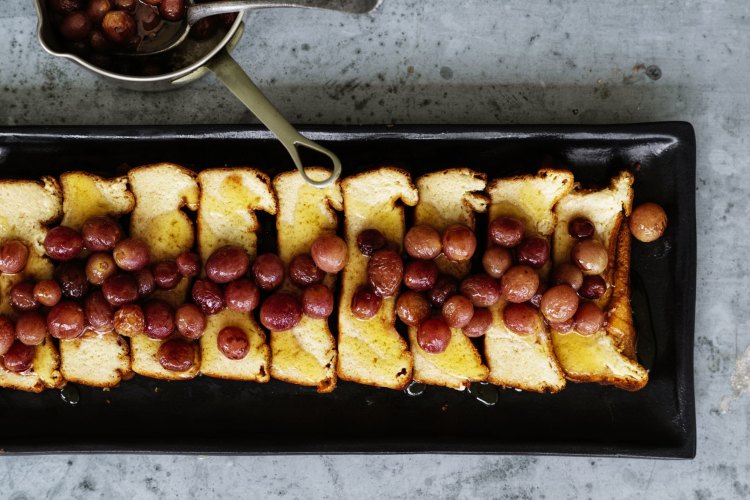 Honey-baked ricotta with roasted red grapes.