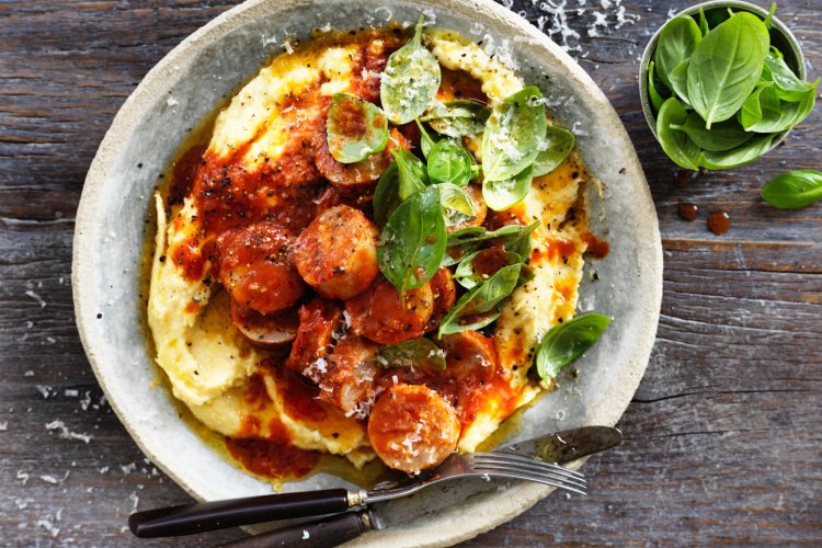 Sausages in sugo with creamy polenta.