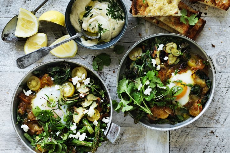 Green shakshuka with hummus.