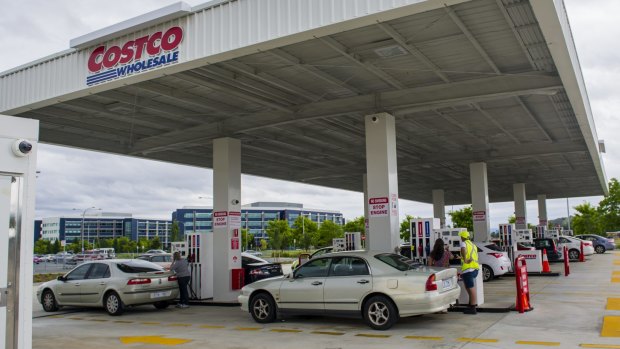 Canberra motorists get in for their cheap fuel at Costco Majura Park on Tuesday afternoon.