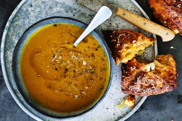 Garlicky sweet potato and chickpea soup served with spiced red onion and feta scones.