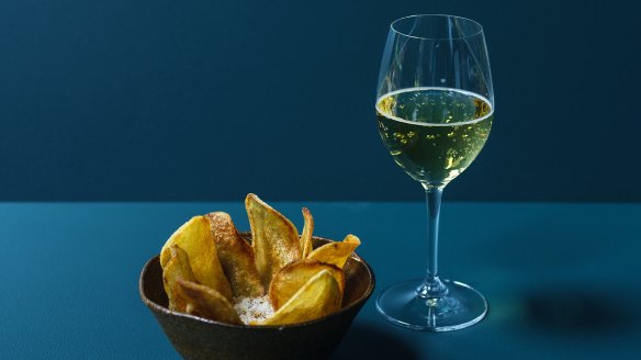 Kangaroo tartare with fresh wasabi, macadamia and potato crisps.