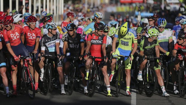 Old hand: Cadel Evans, centre, at the start line for the People's Choice Classic ahead of the 2015 Tour Down Under.