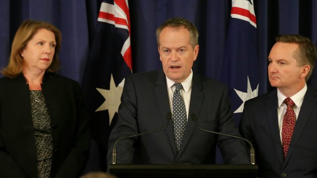 Opposition Leader Bill Shorten, flanked by opposition health spokeswomen Catherine King, and shadow treasurer Chris Bowen on Tuesday.