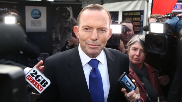 Calls to set a tougher emissions reduction target: Prime Minister Tony Abbott.