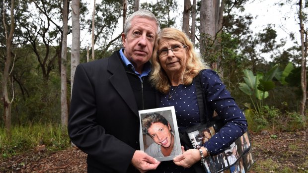 Matthew Leveson's parents, Faye and Mark, with a photograph of him.