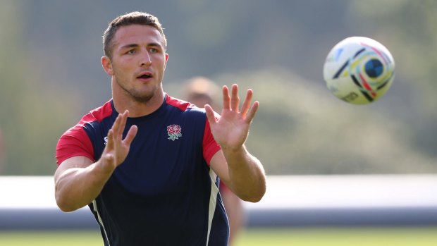 Staying put: Sam Burgess' brother Tom expects him to remain in rugby union despite heavy criticism following England's poor Rugby World Cup.