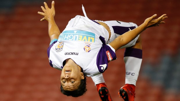 On fire: Sam Kerr performs her trademark somersault after her third goal.