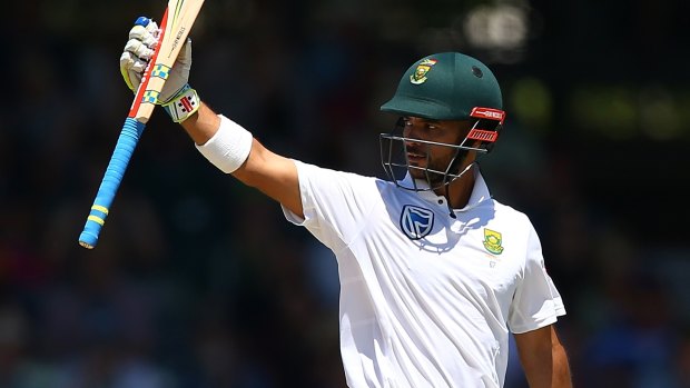 In commanding form: JP Duminy raises his bat to the players rooms after reaching his half century.