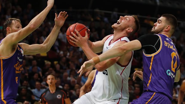 Shout out: Mitchell Cleek controls the ball against the Kings at Qudos Bank Arena in Sydney.