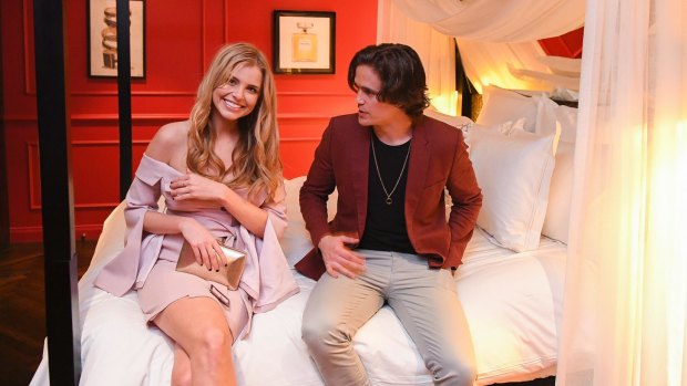 <i>Home And Away's</i> Nic Westaway shows Miss Universe Australia 2014 Tegan Martin around the Dark Romance room at The Star.