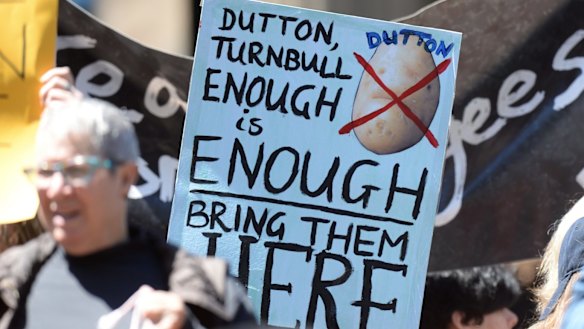 Protesters rally in Melbourne against the treatment of refugees on Manus Island.