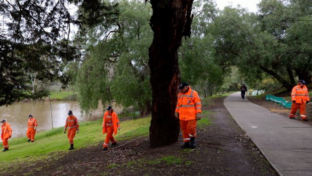 The police and SES searching Canning Reserve, Avondale Heights, along the Maribyrnong River last month for missing woman Karen Ristevski 