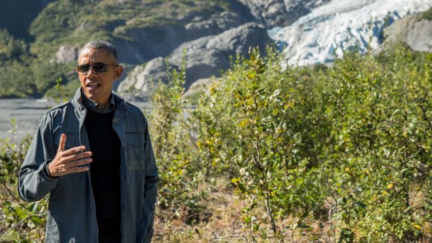 President Barack Obama, pictured here while hiking the Exit Glacier in Seward, Alaska, is looking to sure up his environmental legacy.