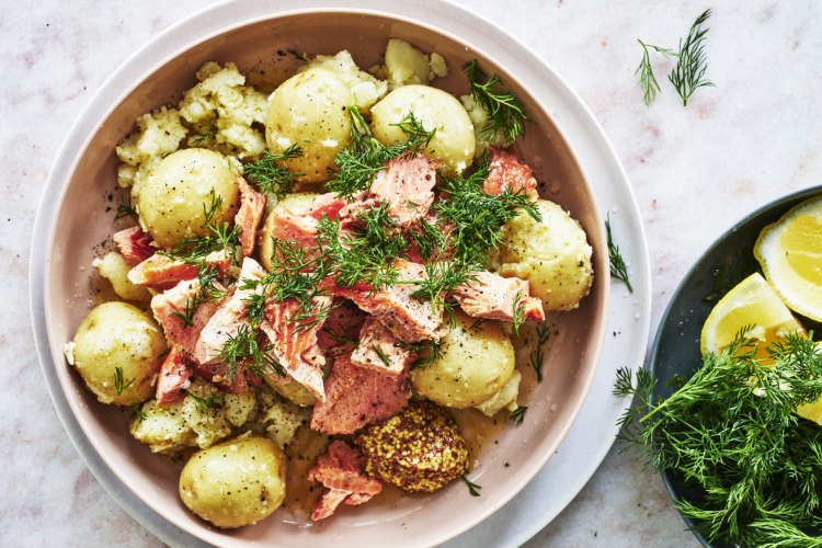 Boiled new potatoes with salmon and dill.