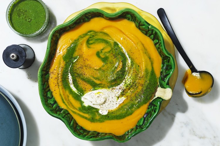 Adam Liaw's roast pumpkin soup with spinach puree and cream.