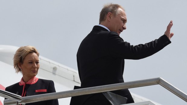 Final wave: Vladimir Putin leaves Brisbane after the G20 summit.