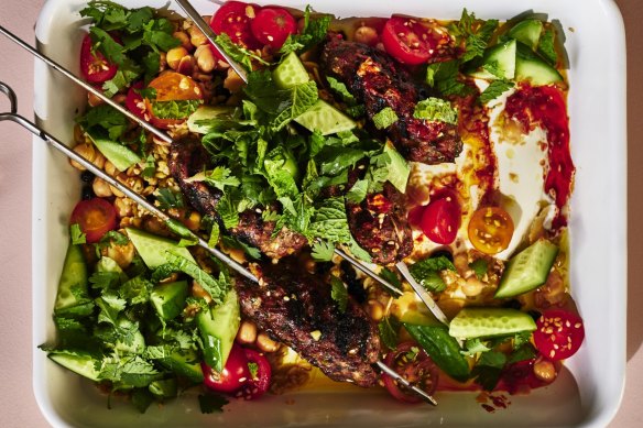 Lamb kofta with freekeh salad and harissa yoghurt.