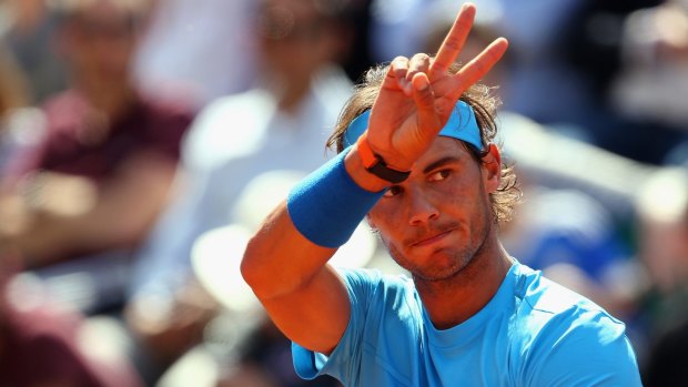Rafael Nadal claims victory over Russian Andrey Kuznetsov at the French Open on Saturday.