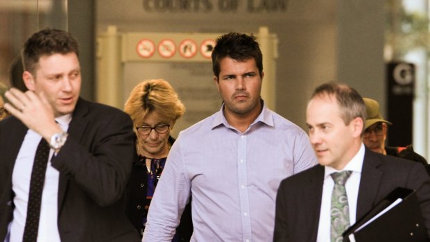 Gable Tostee, left, leaves the Supreme Court in Brisbane with defence barrister Saul Holt, right.