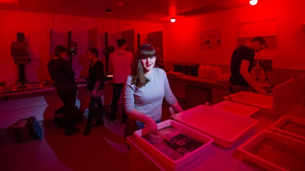 Students working in the recently opened darkroom at Deakin University's Waterfront campus in Geelong. 