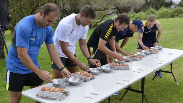 Crack team: Super Rugby referees Stuart Berry, Jaco van Heerden, Glen Jackson, Andrew Lees and Angus Gardner undergo an egg separating stress test at Manly on Monday.