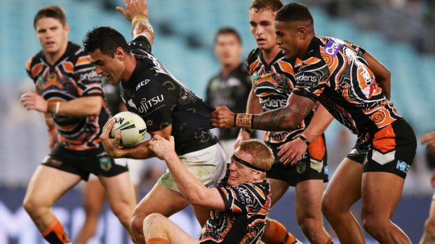 On the loose: Bryson Goodwin takes on the Tigers defence.