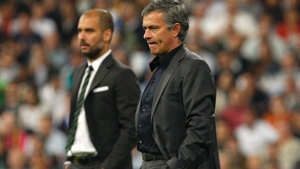 Old foes: Pep Guardiola and Jose Mourinho during the 2011 Clasico.