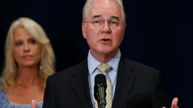 White House senior adviser Kellyanne Conway listens as Secretary of Health and Human Services Tom Price speaks with reporters about the opioid crisis.