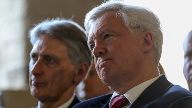Two contenders: Chancellor of the Exchequer Philip Hammond, left, and Brexit secretary David Davis.