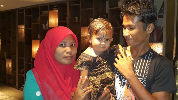 Ali Jasmin with his wife Baualan and his 18-month-old daughter Aisah Nuruna.