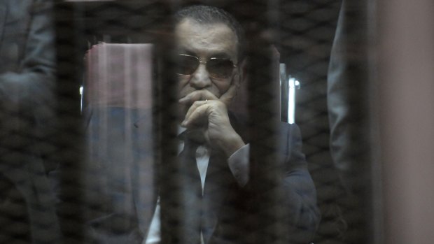 Ousted Egyptian president Hosni Mubarak in the defendant's cage at his verdict hearing on Saturday.